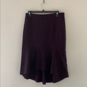 Rich,  purple, high-low, skirt.